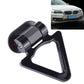 Black car tow hook with gold frame and triangular opening for bumper mounting