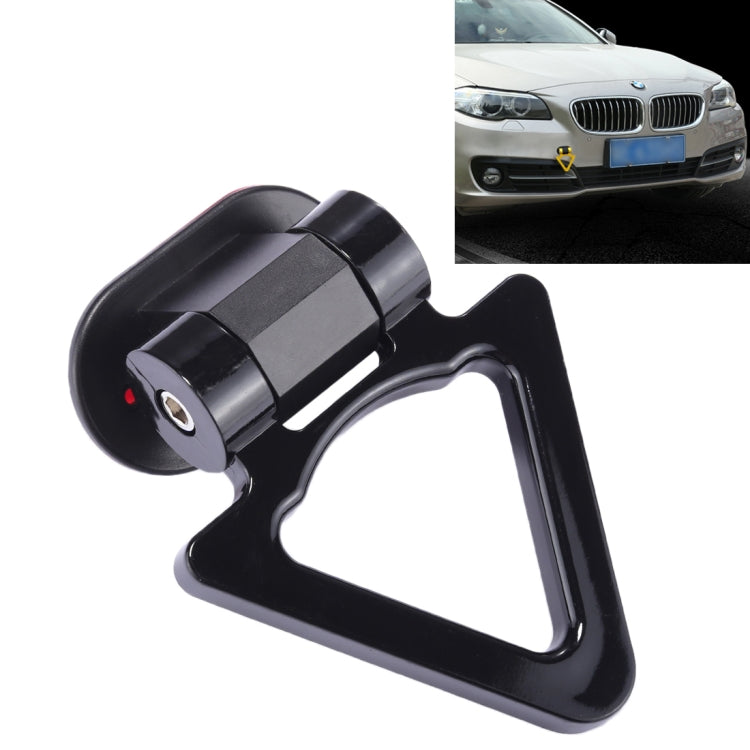 Black car tow hook with gold frame and triangular opening for bumper mounting