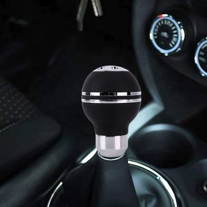 Black ball-shape leather gear shift knob cover with chrome bands and silver base