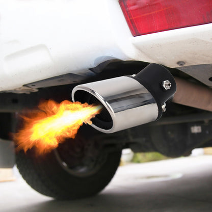 Curved stainless exhaust tail muffler tip with black end cap, flame near outlet