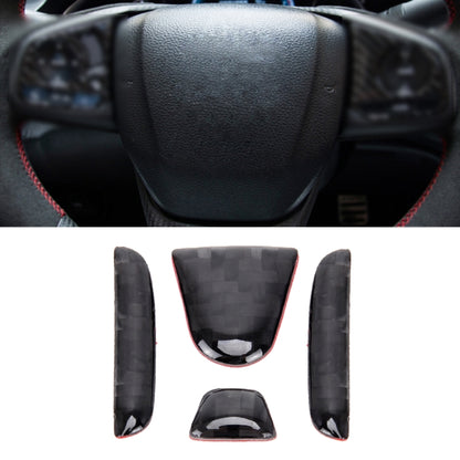 Black leather steering wheel with red trim stitching around rim and center hub