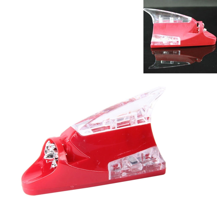 Red shark fin car antenna decoration with clear warning light sections
