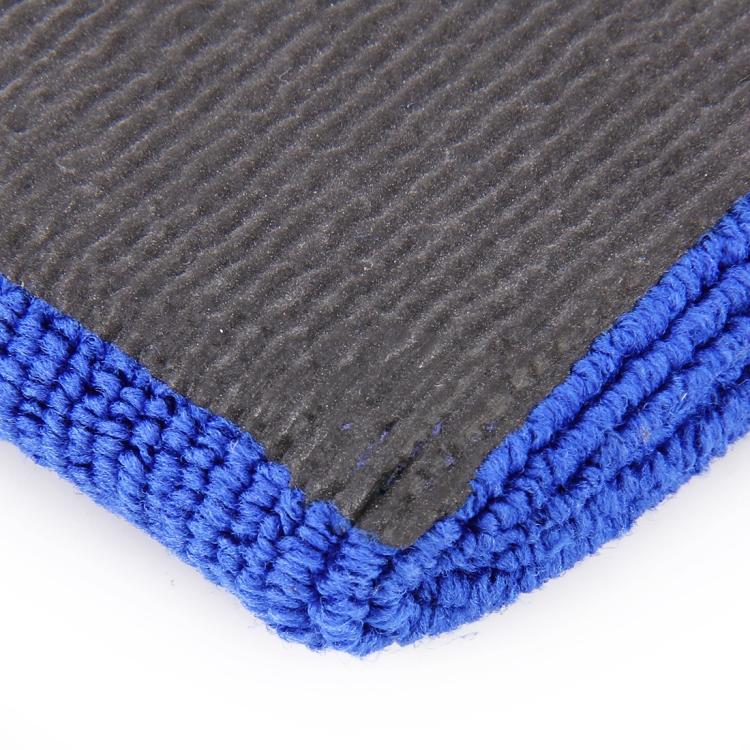 Corner close-up of car washer glove with textured stitching and blue edge