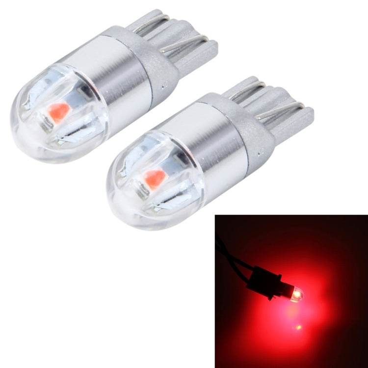 Pair T10 LED car clearance lights, silver base and clear lens; red light glow.