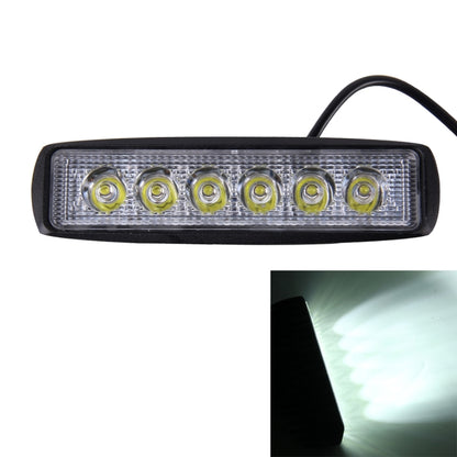 LED emergency spot light with six wafer LEDs in clear lens housing and black mount