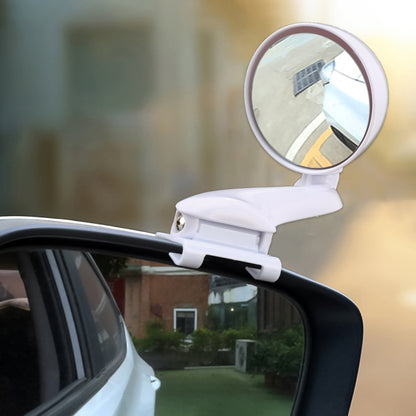 White adjustable blind spot car mirror mounted on vehicle side