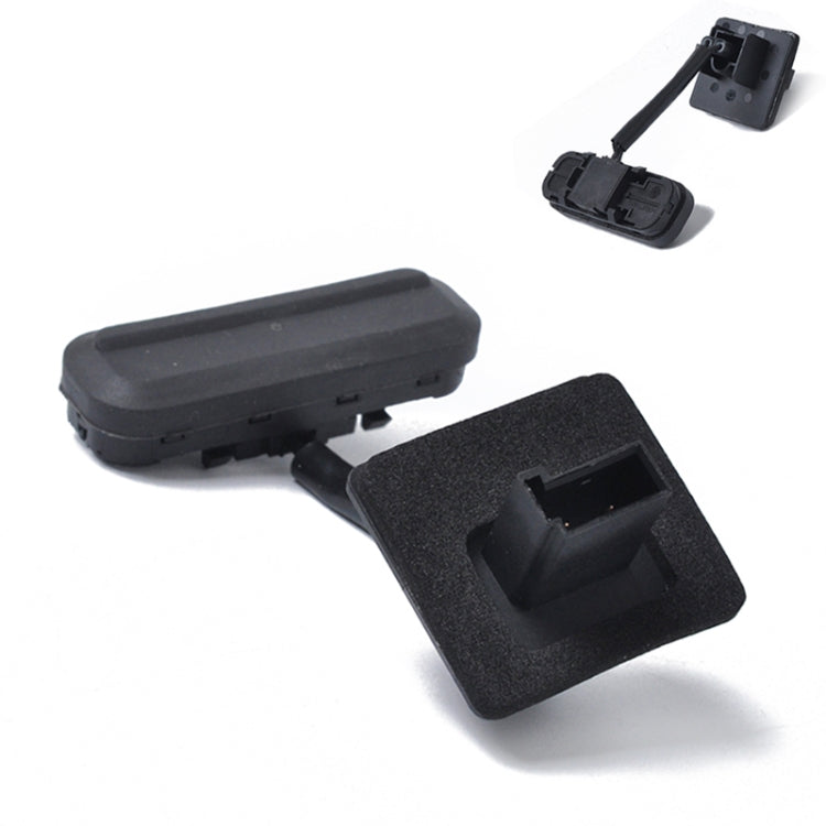 Black tailgate release button switch with socket and mounting base