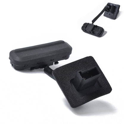 Black tailgate release button switch with socket and mounting base