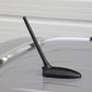 Black car roof AM/FM antenna mounted on vehicle roof