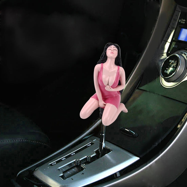 Car shift knob topper with brunette woman figure in magenta outfit on gear area