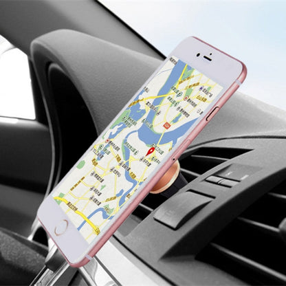 Car dashboard phone mount with rose-pink smartphone and black holder