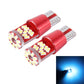 Pair of T10 LED bulbs with blue light glow in front inset