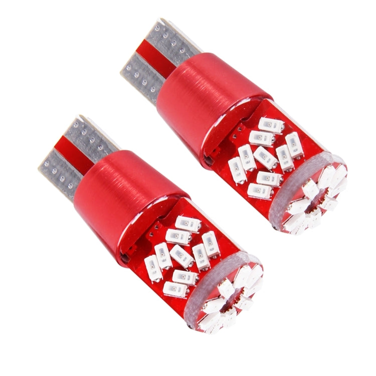 Pair of T10 LED bulbs showing red body, clear side housings, and SMD chips