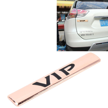 VIP 3D metal car sticker on rear of a white vehicle with VIP badge