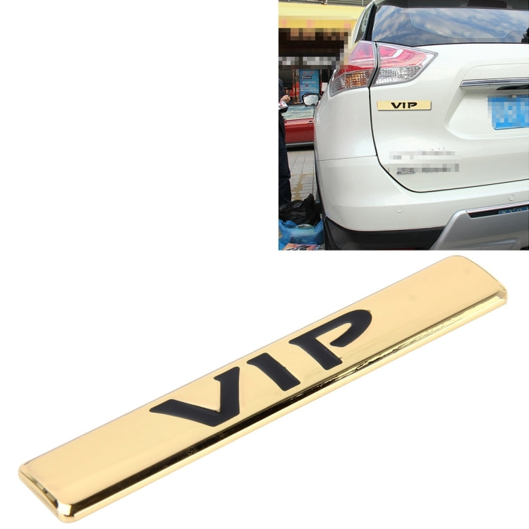 Champagne gold VIP 3D metal sticker with raised VIP logo, close-up