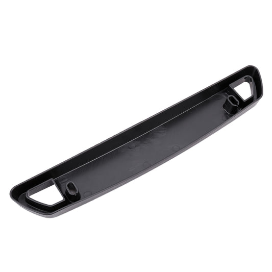 Dark license plate frame holder, rear view with centered opening and corner brackets