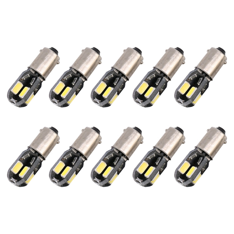Ten BA9S LED bulbs lined up, silver bases with dual yellow SMD LED chips