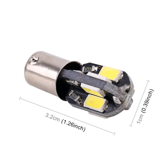 BA9S LED bulb close-up with silver metal base and two yellow SMD LED chips