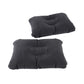 Black inflatable air bed mattress with raised pillow sections, laid flat for travel