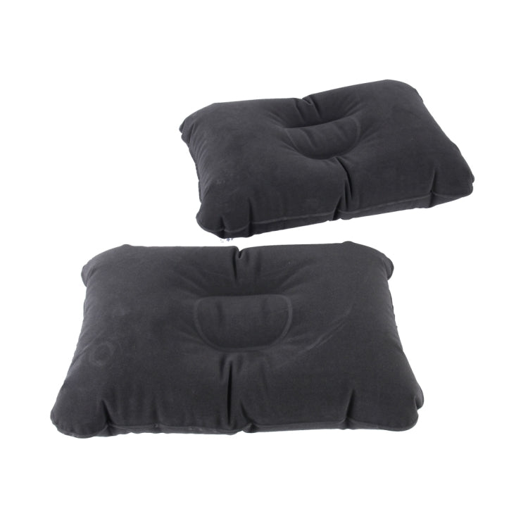 Black inflatable air bed mattress with raised pillow sections, laid flat for travel