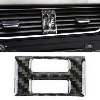 Carbon fiber air conditioning switch trim sticker on car dashboard, two switch openings