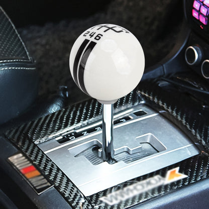 White resin 6-speed gear shift knob with black 246 markings and cross stripes