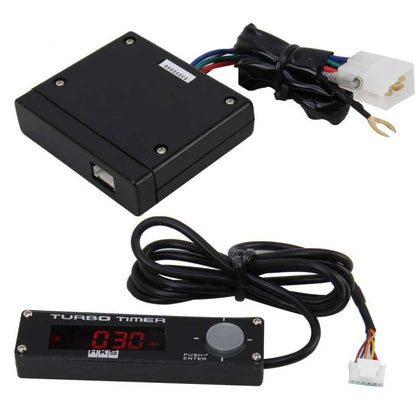 Car turbo timer control unit with turbine protector box, wiring, and electrical connector.