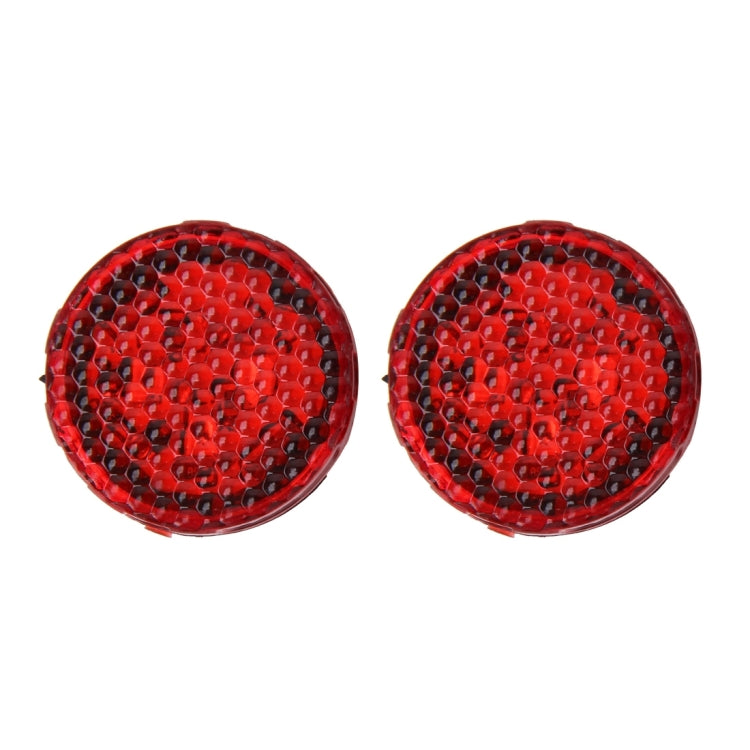 Car door anti-collision warning strobe lights showing red light glow through lens