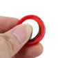 Car door anti-collision warning strobe light close-up, red lens with circular rim