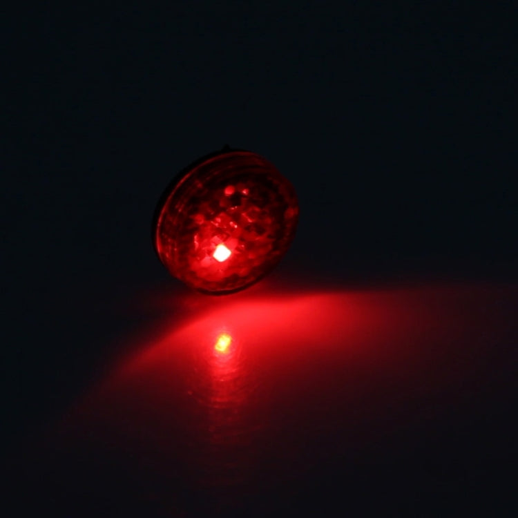 Car door anti-collision warning strobe light emitting red light from round lens