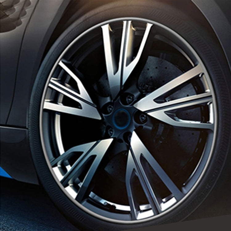 Car wheel showing a smooth rim with no visible colored trim ring