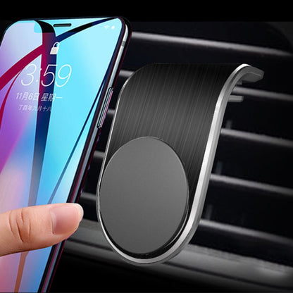 Air outlet magnetic phone holder with dark gray circular magnet face and metal frame