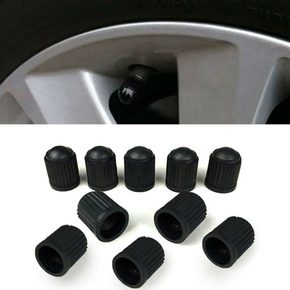 Black ribbed rubber tire valve dust caps, set of 5 shown