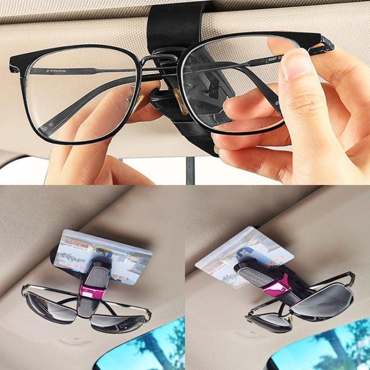 Car visor eyeglass holder clip with spring clamp, glasses attached on seatback