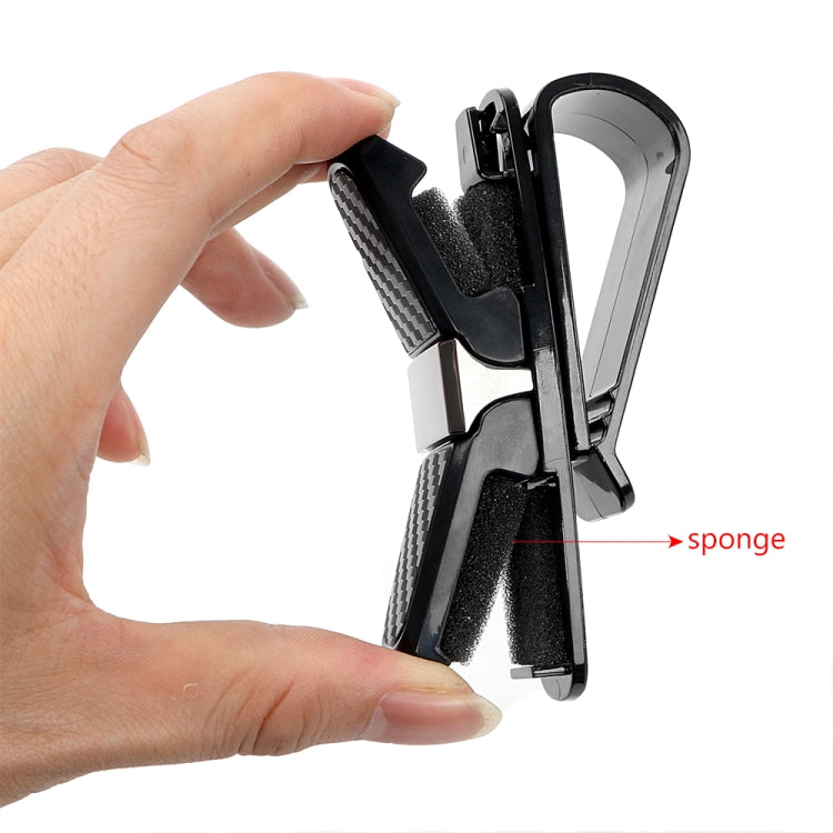 Car eyeglasses clip holder, hand holding U clip with textured sponge grip