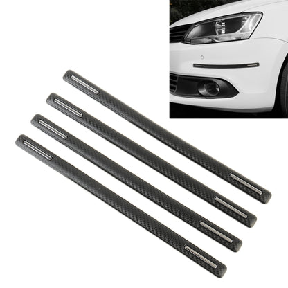 Black carbon-fiber anti-collision trim strips, each with a silver bar