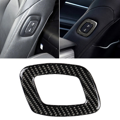 Carbon fiber seat adjustment trim sticker around power control buttons, black interior