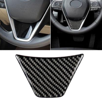 Triangular carbon fiber steering wheel trim sticker on dark steering column insert