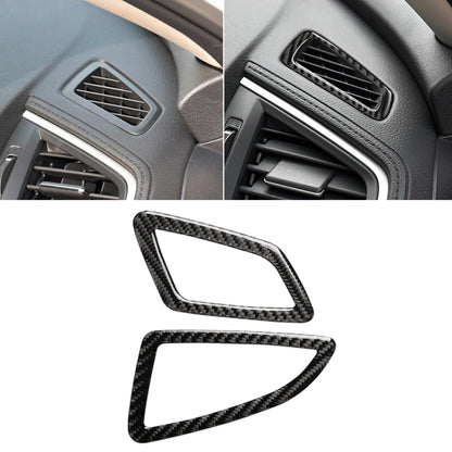 Carbon fiber air vent trim sticker installed on dashboard instrument outlet opening.