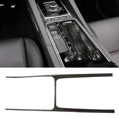 Carbon-fiber look trim sticker frame on car center console storage area