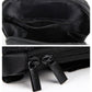 Black bicycle front bag close-up showing double zippers and tab pulls