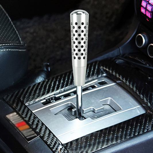 Silver shift knob with perforated mesh sleeve and black dot pattern