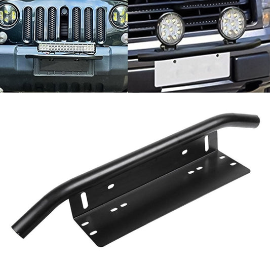 Black universal license plate bracket frame with two round light pods, mounted on a vehicle