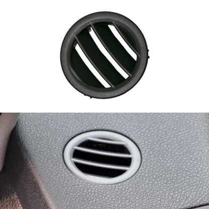 Circular dashboard air vent outlet with black bezel and three adjustable slats