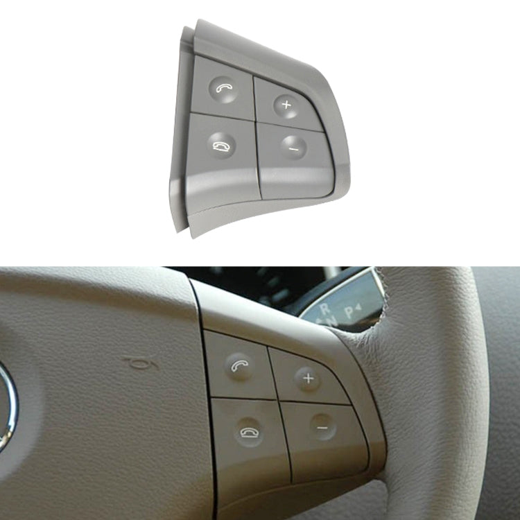 Light grey 4-button steering wheel switch panel with volume and phone-style icons