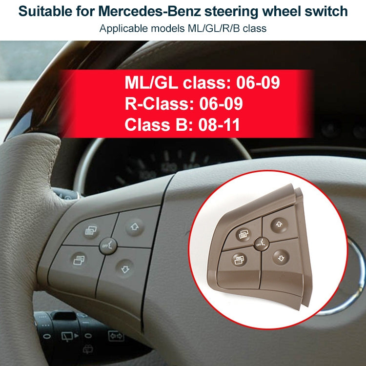 Beige 4-button steering wheel switch panel with volume and arrow icons