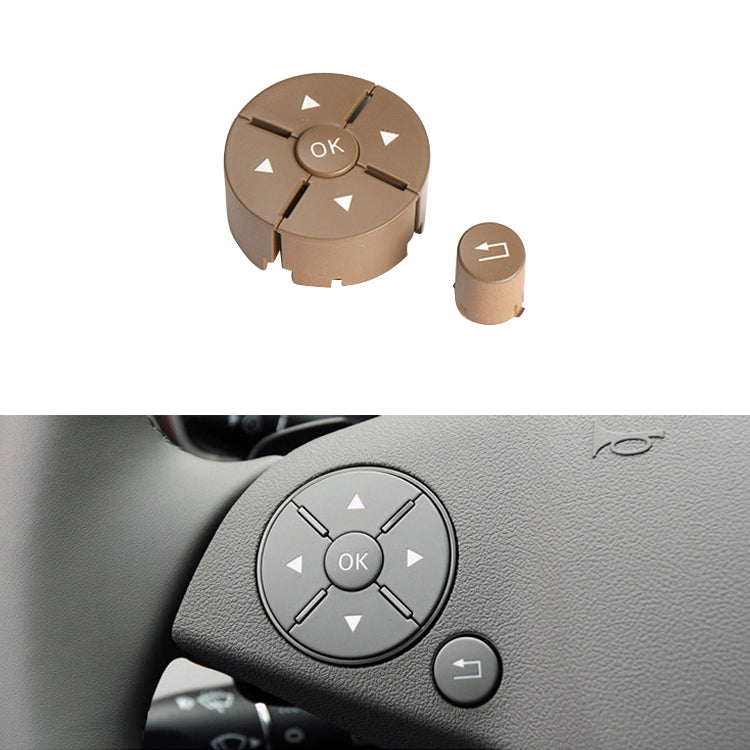 Beige steering wheel switch button panel with OK ring and arrow icons, left control