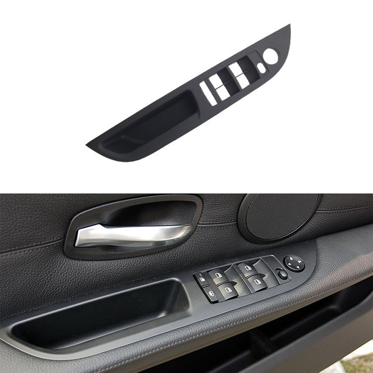 Black window switch trim panel for left front door, with control buttons and switches