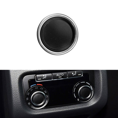 Rear AC knob trim cover with black center and chrome outer ring
