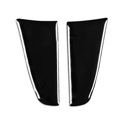 Pair of black glossy steering wheel trim inserts with silver chrome edges